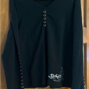 Long sleeved, v-neck Harley Davidson shirt.